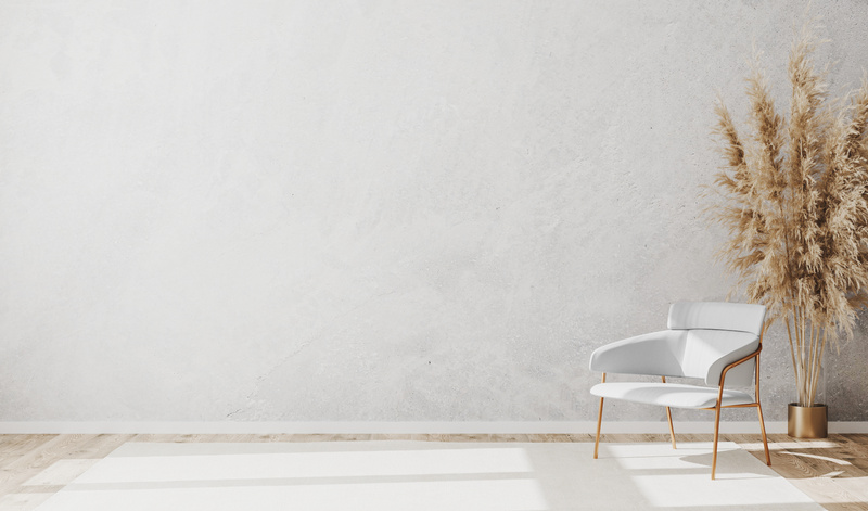 Armchair and Pampas Grass in a Room with Blank Wall